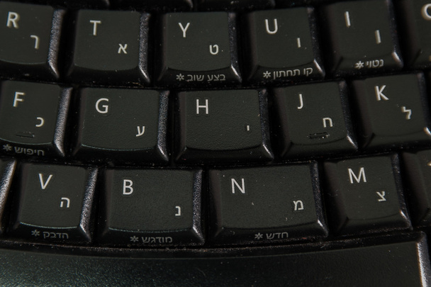Keyboard with letters in Hebrew and English - Photo, Image