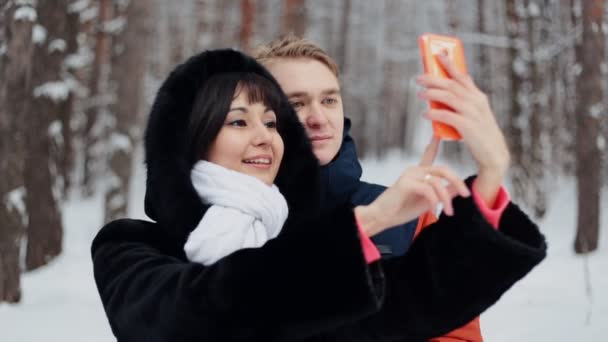 Happy couple taking selfie - Кадри, відео