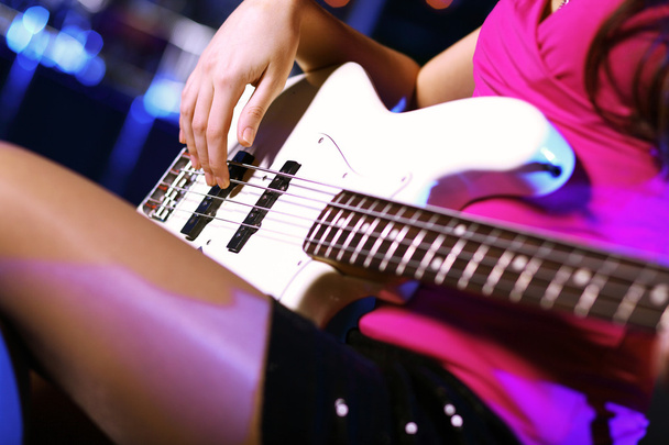 Young guitar player performing in night club - Foto, Imagem