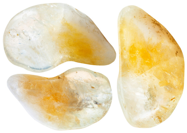 tres piedras preciosas de citrino amarillo aisladas en blanco
 - Foto, imagen