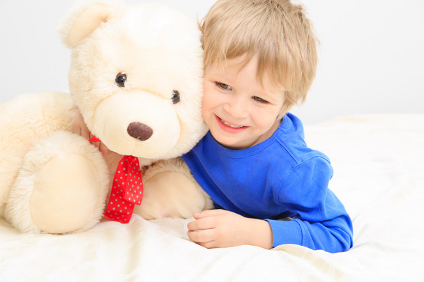 cute little boy with teddy bear - Fotó, kép