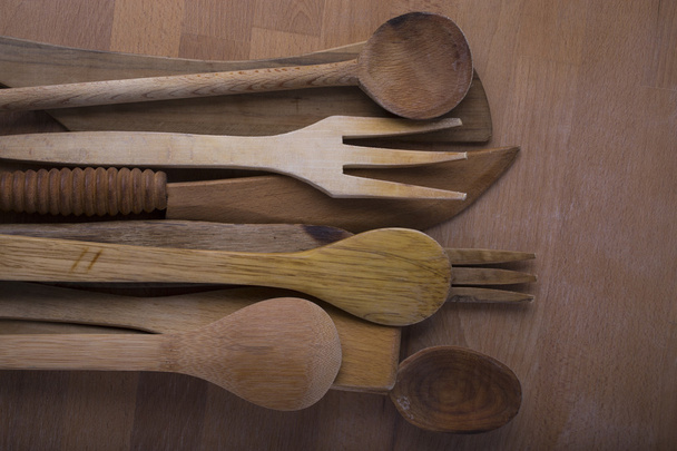 tenedores, cucharas y cuchillos de madera
 - Foto, imagen