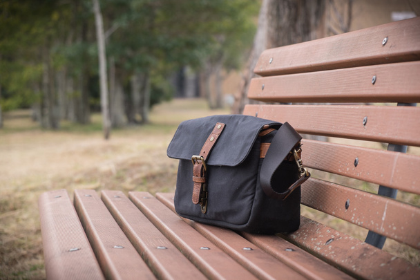 Bag on bench - Photo, Image