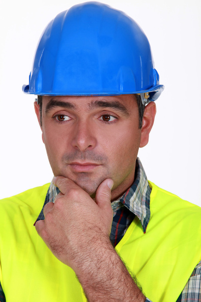 A worried tradesman - Foto, afbeelding