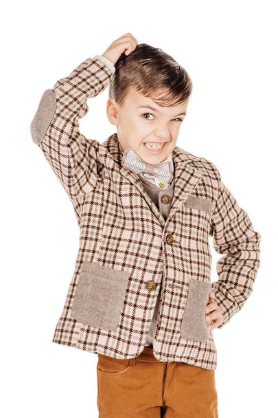 Portrait adorable young happy boy looking at camera isolated on  - Foto, Bild
