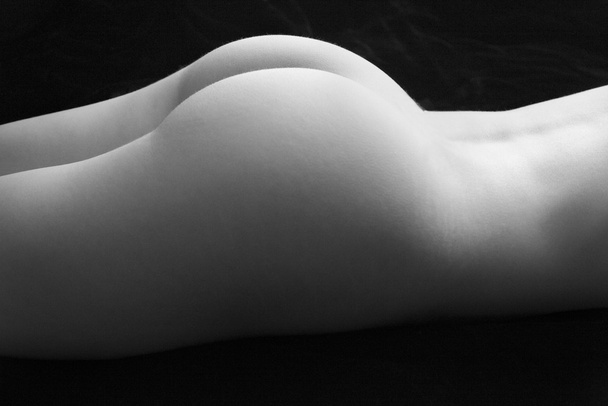 Nude female buttocks. - Zdjęcie, obraz