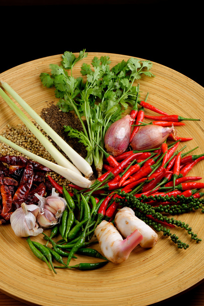 Asian herbs, spices and vegetables on the wooden plate - Foto, Bild
