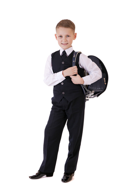 Full length portrait of a boy in a suit standing with schoolbag - Foto, afbeelding
