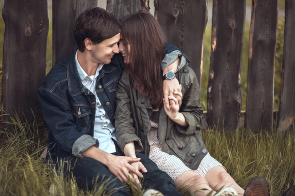 Beautiful young couple in love outdoors - Foto, Imagen