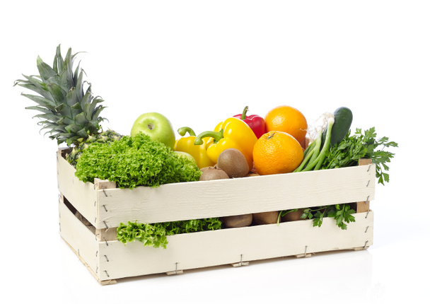 Fruits and vegetables on wooden crane - Photo, Image