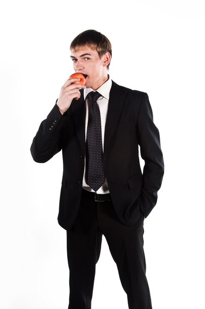 Business man with a red apple - Foto, Imagem