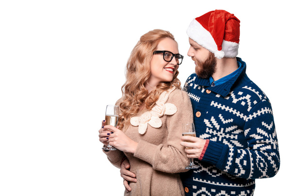 Beautiful couple in Santa hat - Fotoğraf, Görsel