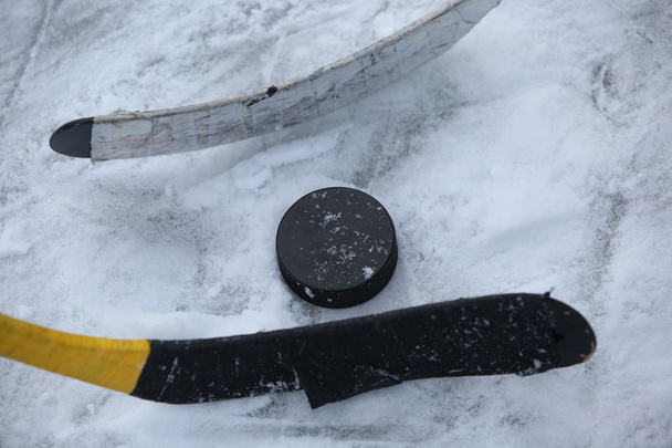 Hockey Sticks and Puck - Photo, Image