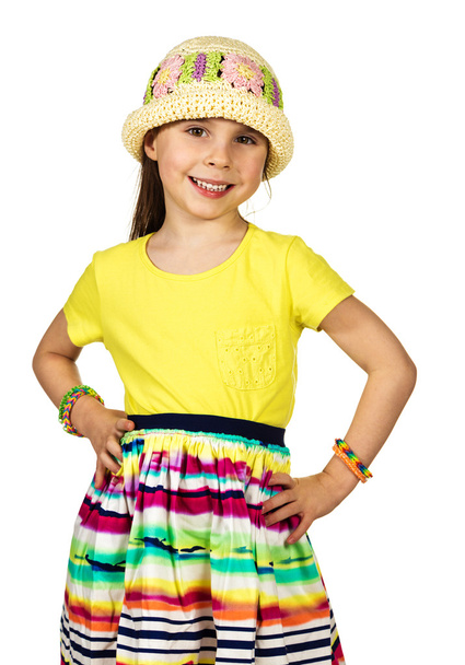 Cute little fashion girl in colorful summer clothes and hat - Foto, Imagem