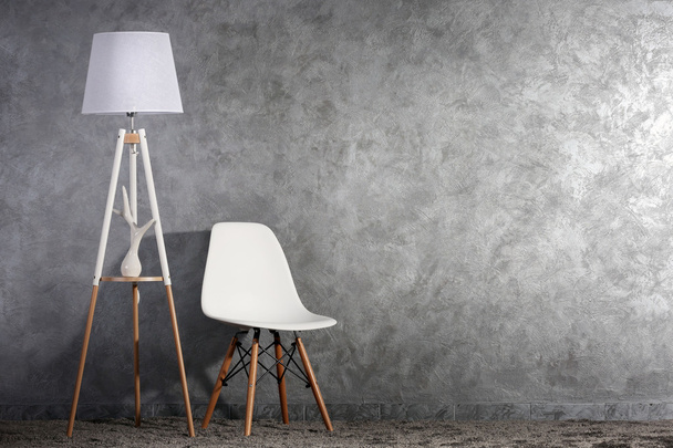 Stylish conception with chair and lamp  - Zdjęcie, obraz