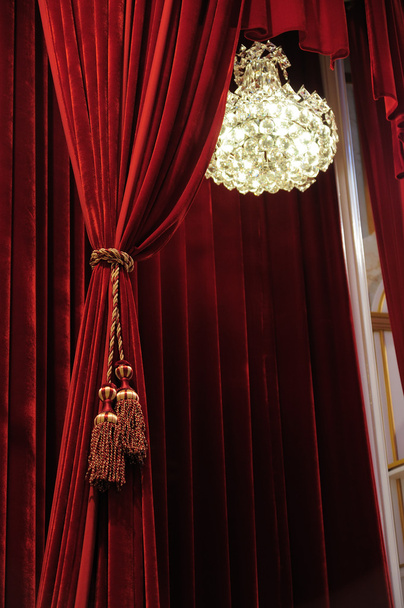 Chandelier with red curtains - Photo, Image