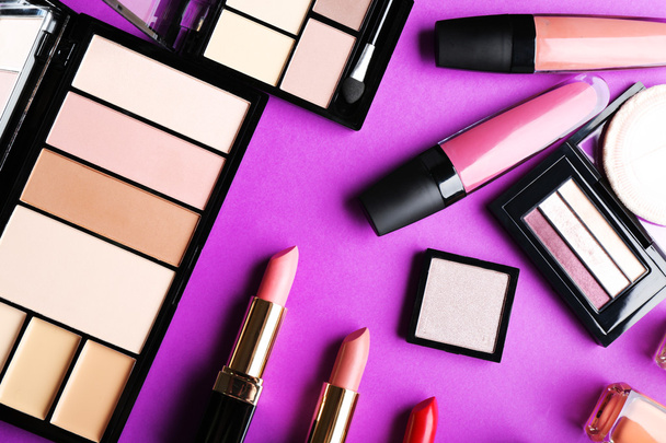 Cosmetics set on purple background - Photo, Image