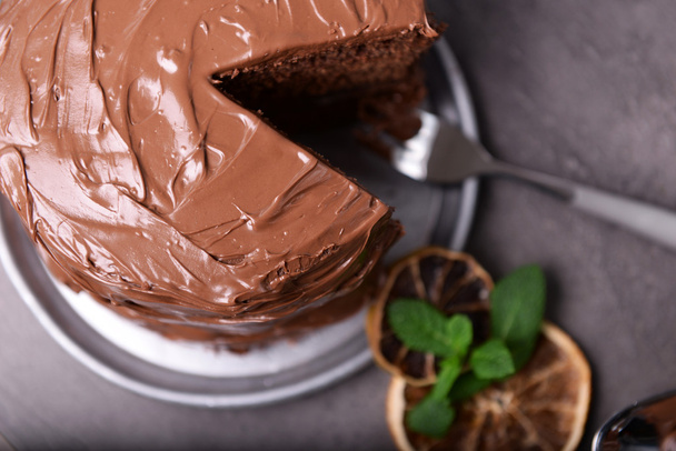 Chocolate pie with fork and ingredients on table - Zdjęcie, obraz