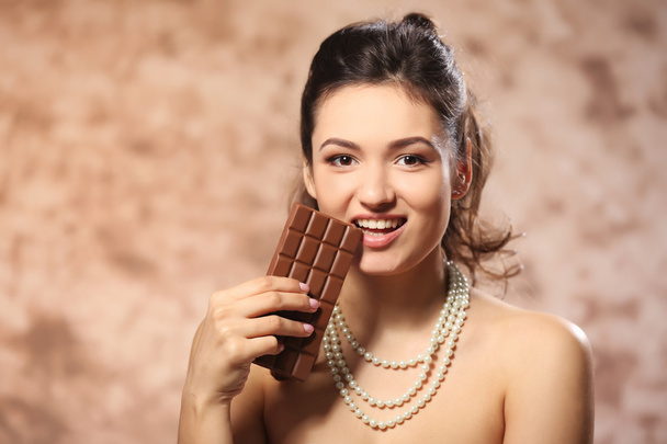 young woman with chocolate - Foto, Imagem