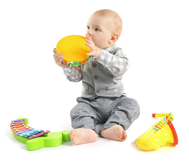 Adorable baby with toys  - 写真・画像