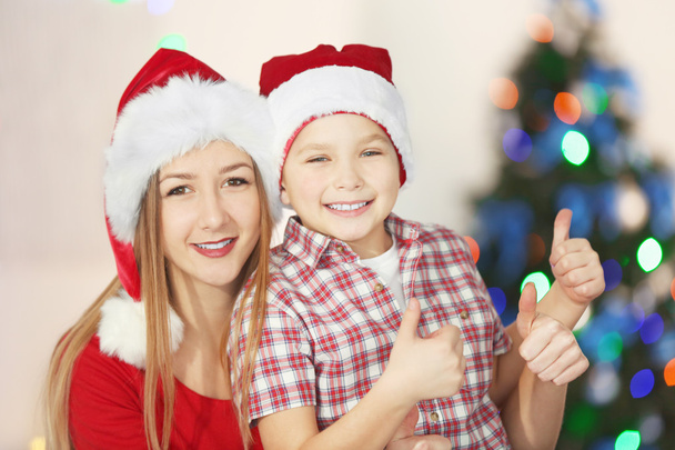 girl and boy in Christmas room - Photo, image