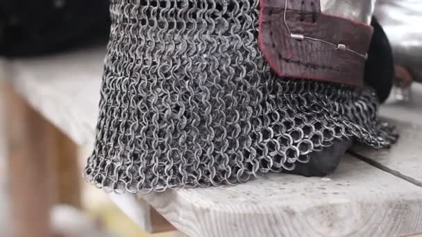 Steel helmet with chain mail face mask, medieval blacksmith armour forging craft - Video