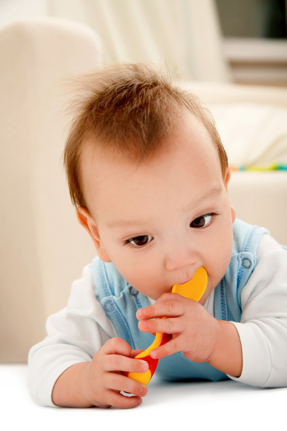 Baby with spoon - Foto, afbeelding