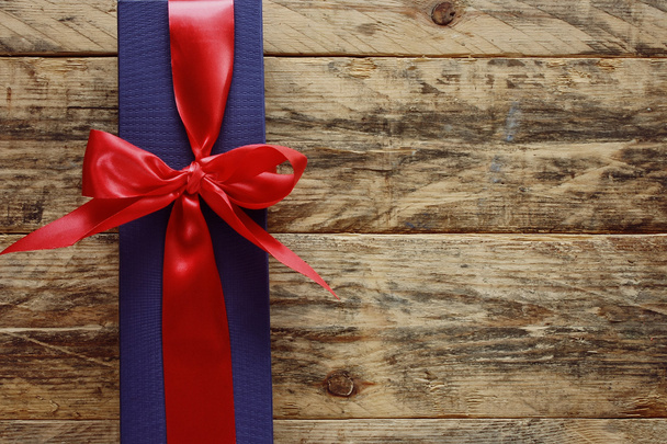 blue gift box with red ribbon - 写真・画像