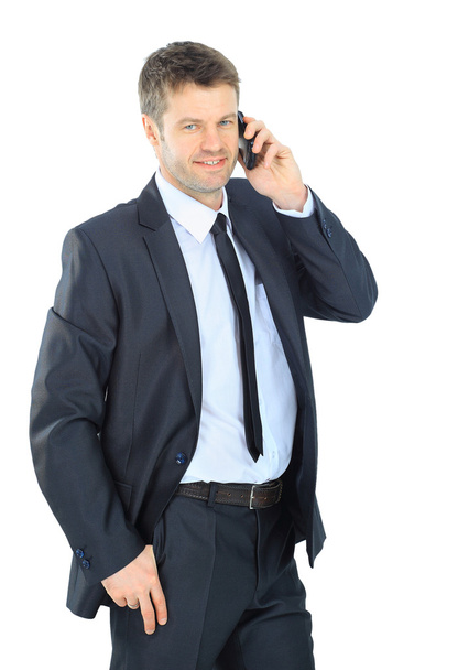 Portrait of a business man with phone isolated on white backgrou - Fotó, kép