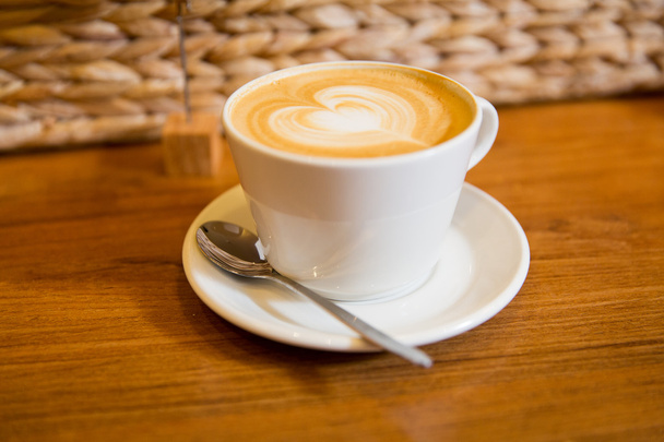 close up of coffee cup with heart shape drawing - Φωτογραφία, εικόνα