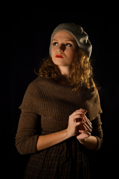 Sure, beautiful, snorting, stunning lady, woman, girl with good manners, gray beret, cap, red lips on black background, curly, short hear, nice dress, important, eyesight. - Photo, Image