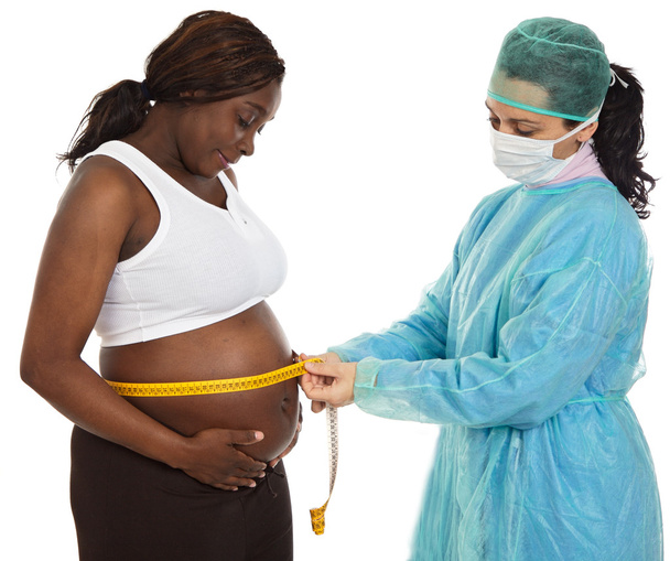 Lekarz badający kobietę w ciąży - Zdjęcie, obraz