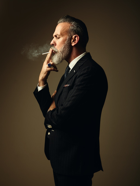 Portrait of smoking gentleman - Photo, Image