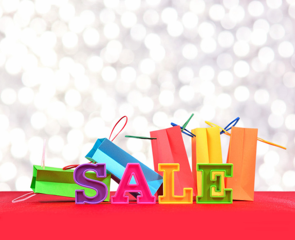 Sale written by colorful letters - Фото, изображение