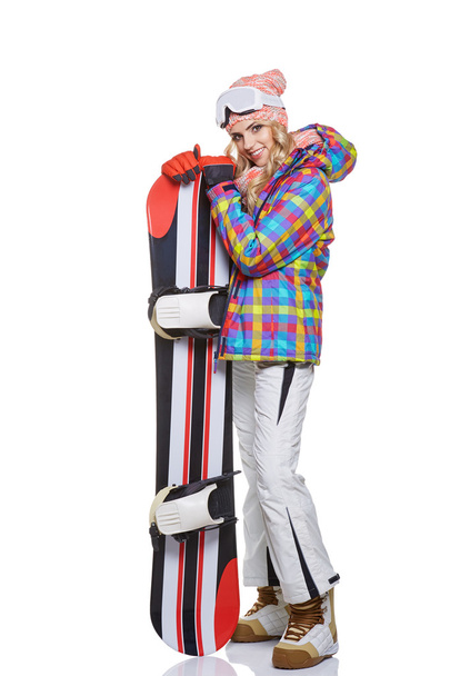 woman in snowboarder suit - Фото, изображение