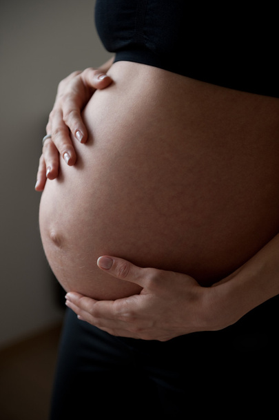 Pregnant belly closeup - Fotoğraf, Görsel