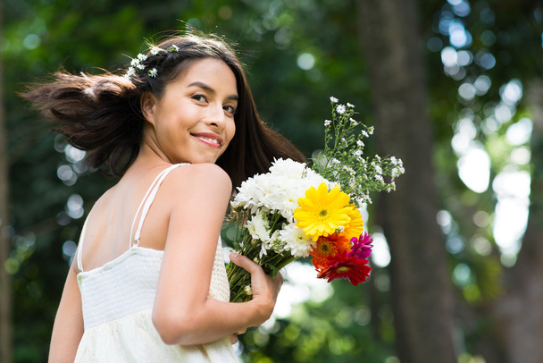 girl with Summer bouquet - Фото, изображение
