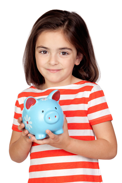 Bruna bambina con un moneybox blu
 - Foto, immagini