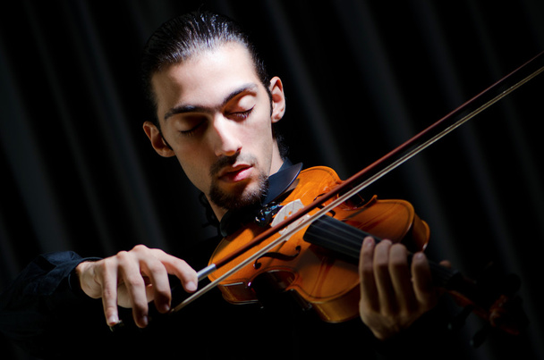 Violin player playing the intstrument - Photo, Image