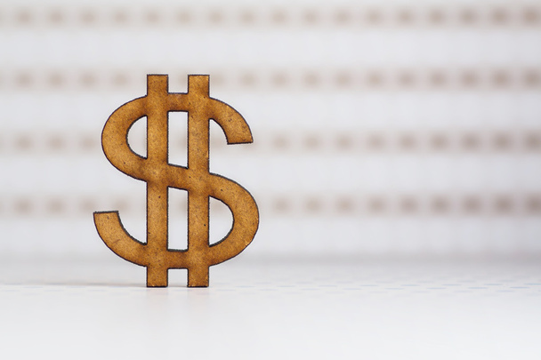 Иконка деревянного доллара на светлом пятнистом фоне
 - Фото, изображение