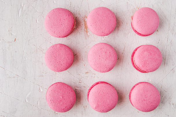 Pink macaroon on a white table - Photo, Image