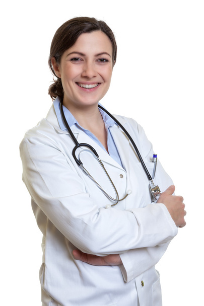 Laughing caucasian female doctor with dark hair and crossed arms - Foto, Bild