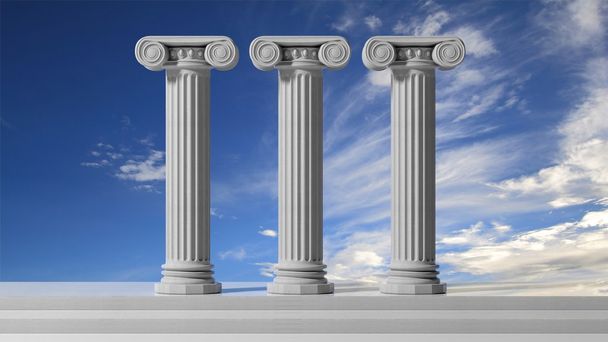 Three ancient pillars with blue sky background. - Photo, Image
