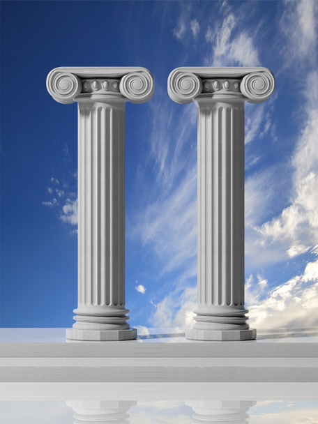 Two ancient pillars with blue sky background. - Photo, Image