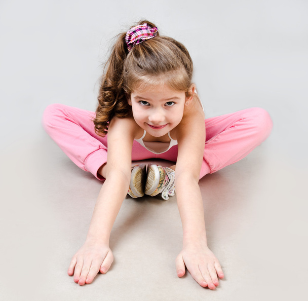 Cute smiling little girl gymnast - Фото, зображення