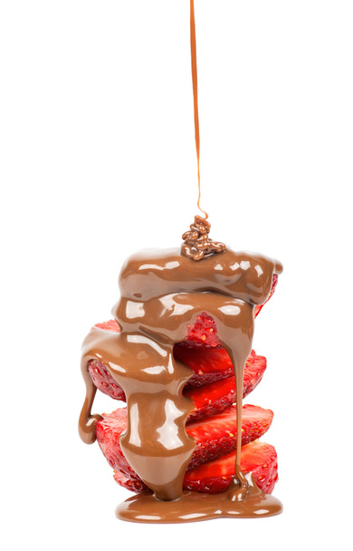 Schokolade auf Erdbeerscheiben gießen - Foto, Bild