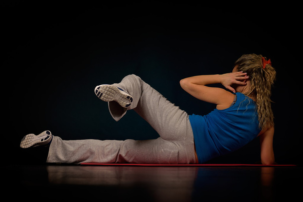 young woman exercising - Φωτογραφία, εικόνα