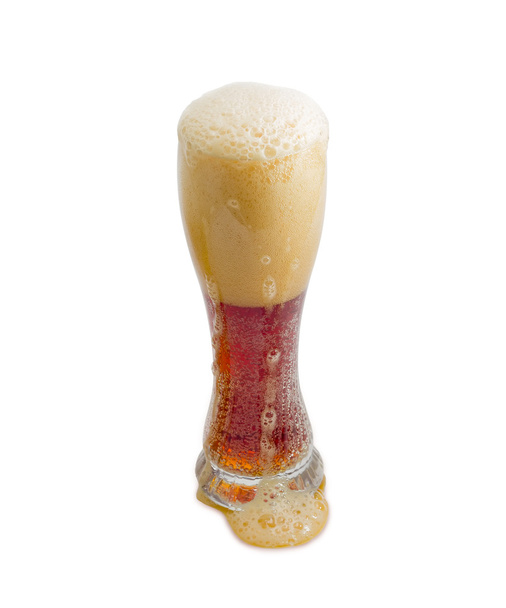 Beer glass with dark beer and head of foam - Fotó, kép
