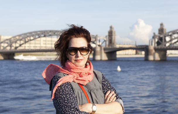 Elegant woman on the background of the Neva and Bolsheokhtinsky bridge. St. Petersburg. - Photo, Image