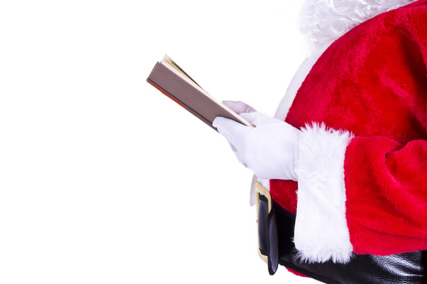 Papai Noel com livro isolado
 - Foto, Imagem